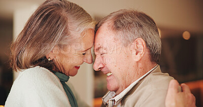 Buy stock photo Senior couple, hug and happy in home, profile and care with bonding, love or loyalty in retirement. Elderly people, man and woman with forehead touch, smile and connection in relationship at house