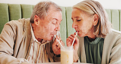 Buy stock photo Milkshake, straw or senior couple in cafe with love, drinks or drink for romance, date or anniversary. Retirement, smile or people in romantic relationship for smoothie, break or support in diner