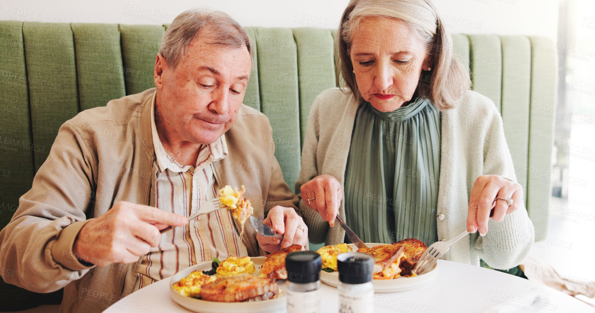 Buy stock photo Eating, breakfast or senior couple in cafe on date together in retirement for love, eggs or food. Taste, hungry or elderly people in restaurant with lunch and care at diner for romantic anniversary