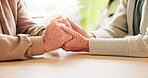 Holding hands, support and senior couple in home with comfort, bonding or connection in relationship. Empathy, trust and elderly man with woman for care, love and romance in marriage in house.