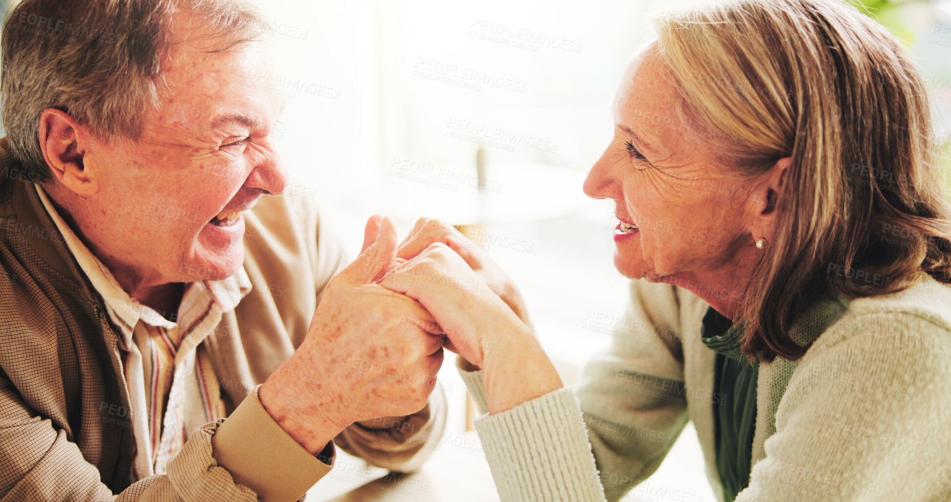 Buy stock photo Love, holding hands and smile with old couple in home for romance, bonding and anniversary. Happy, support and trust with elderly man and woman for connection, retirement and solidarity together