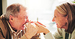 Senior couple, happy and holding hands at cafe for connection, love or bonding on date at restaurant. Senior people, man and woman with laugh, trust and funny memory with loyalty at coffee shop