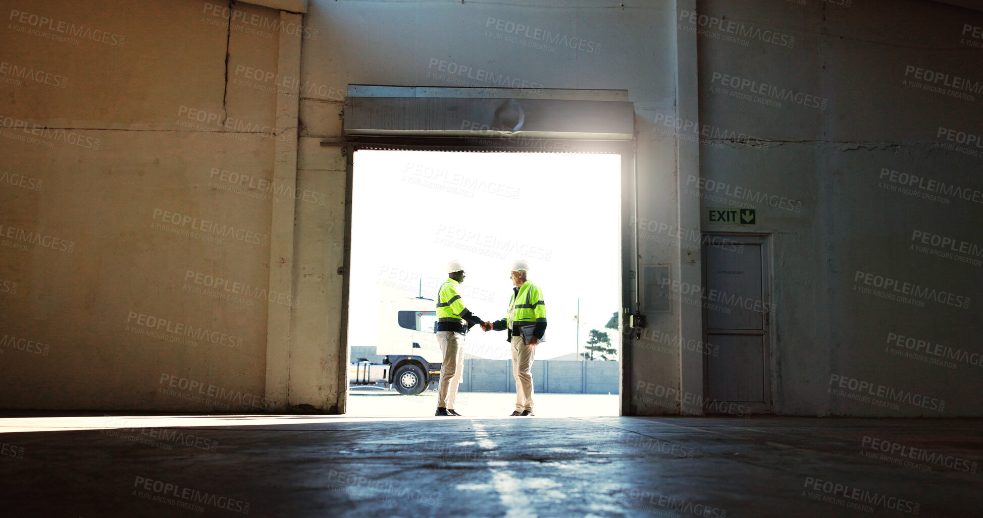 Buy stock photo Construction, logistics and men with handshake in warehouse for collaboration, new project or deal. Engineering, contractors and shaking hands with partnership for labor management and transportation