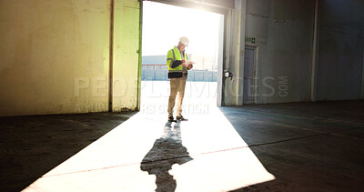 Buy stock photo Construction site, empty warehouse and man on tablet for inspection, building development and maintenance. Engineering, industrial and person on digital tech for project, infrastructure or planning