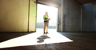 Buy stock photo Construction, warehouse and man on tablet thinking for inspection, building development or maintenance. Engineering, industrial site and person on digital tech for project, infrastructure or planning