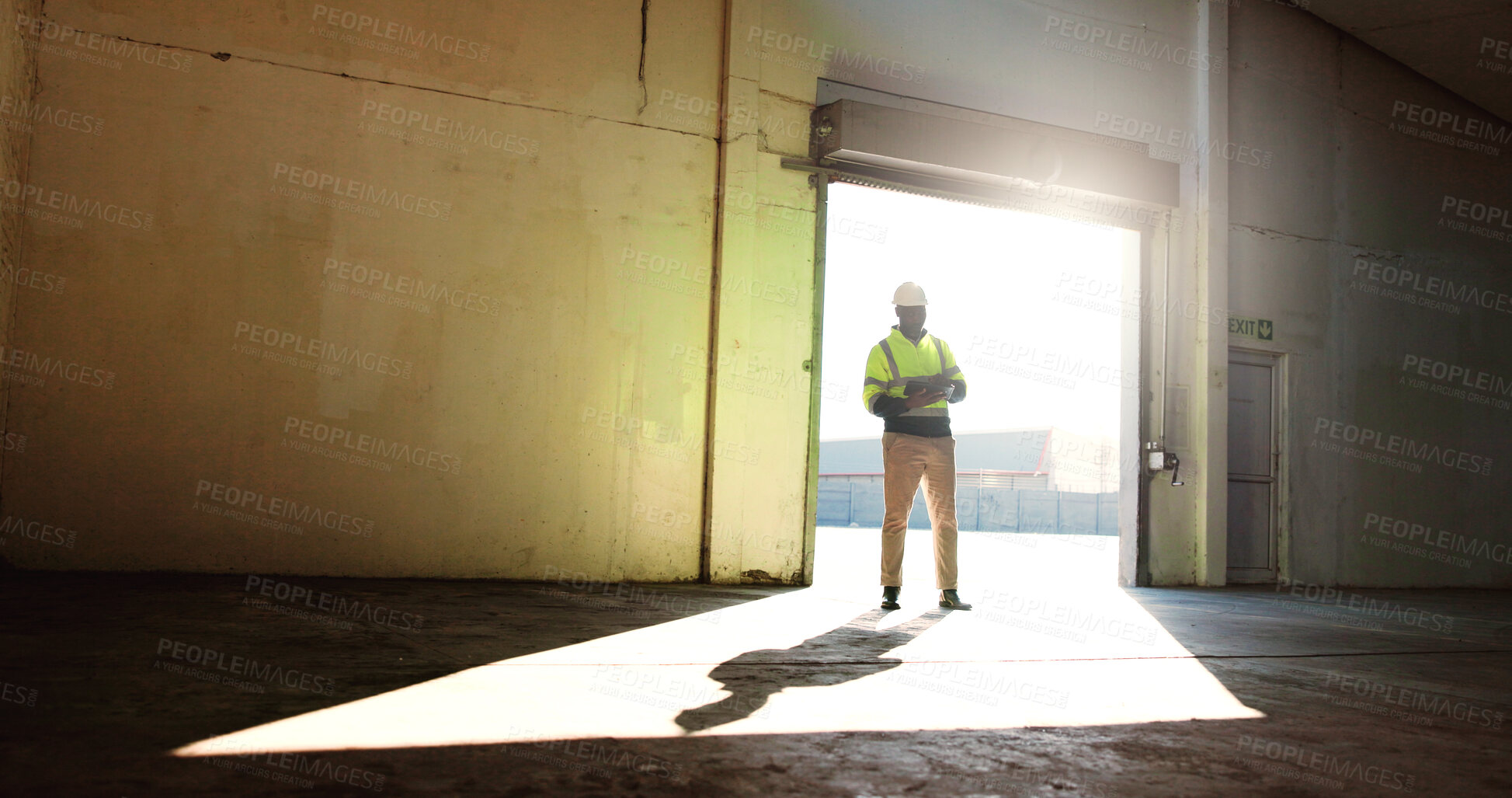 Buy stock photo Construction, empty warehouse and man with tablet for inspection, building development and maintenance. Engineering, industrial site and person on digital tech for project, infrastructure or planning