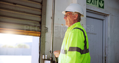 Buy stock photo Man, garage door and open for distribution, logistics and storage for supply chain at warehouse. Mature person, engineer and maintenance with safety check, smile and security for cargo at plant
