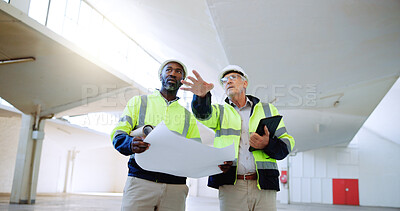 Buy stock photo Construction, planning and men with blueprint in building for collaboration, project ideas and renovation. Engineering, architecture team and people with documents for floor plan, layout and design