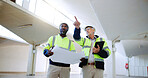 Construction, pointing and men with blueprint in building for collaboration, project ideas and renovation. Engineering, architecture team and people with documents for floor plan, layout and design