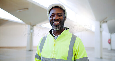 Buy stock photo Mature architect, black man and smile at building for expansion, portrait and property development. African person, engineer and contractor at construction site with pride for career in Nigeria