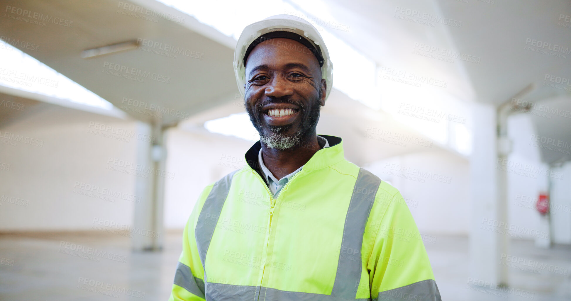 Buy stock photo Mature architect, black man and smile at building for expansion, portrait and property development. African person, engineer and contractor at construction site with pride for career in Nigeria