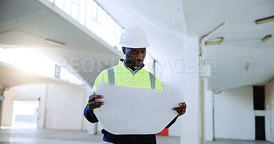 Buy stock photo Construction, reading blueprint and black man in building for inspection, project development or planning. Engineer, industrial site and person with documents for floorplan, infrastructure and layout