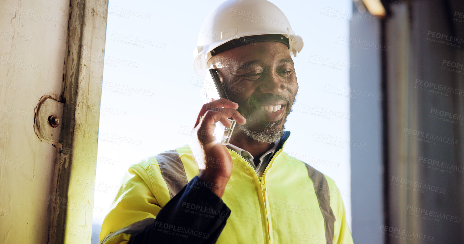 Buy stock photo Happy, construction and black man with phone call talking for contact, logistics and maintenance. Engineering, contractor and mature person on smartphone for planning, infrastructure or communication