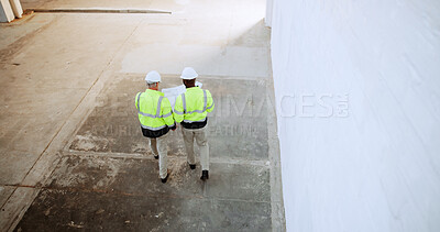 Buy stock photo Construction, walking and above of men with blueprint for collaboration, building ideas or renovation. Engineering, architecture team and back of people with documents for floorplan, layout or design