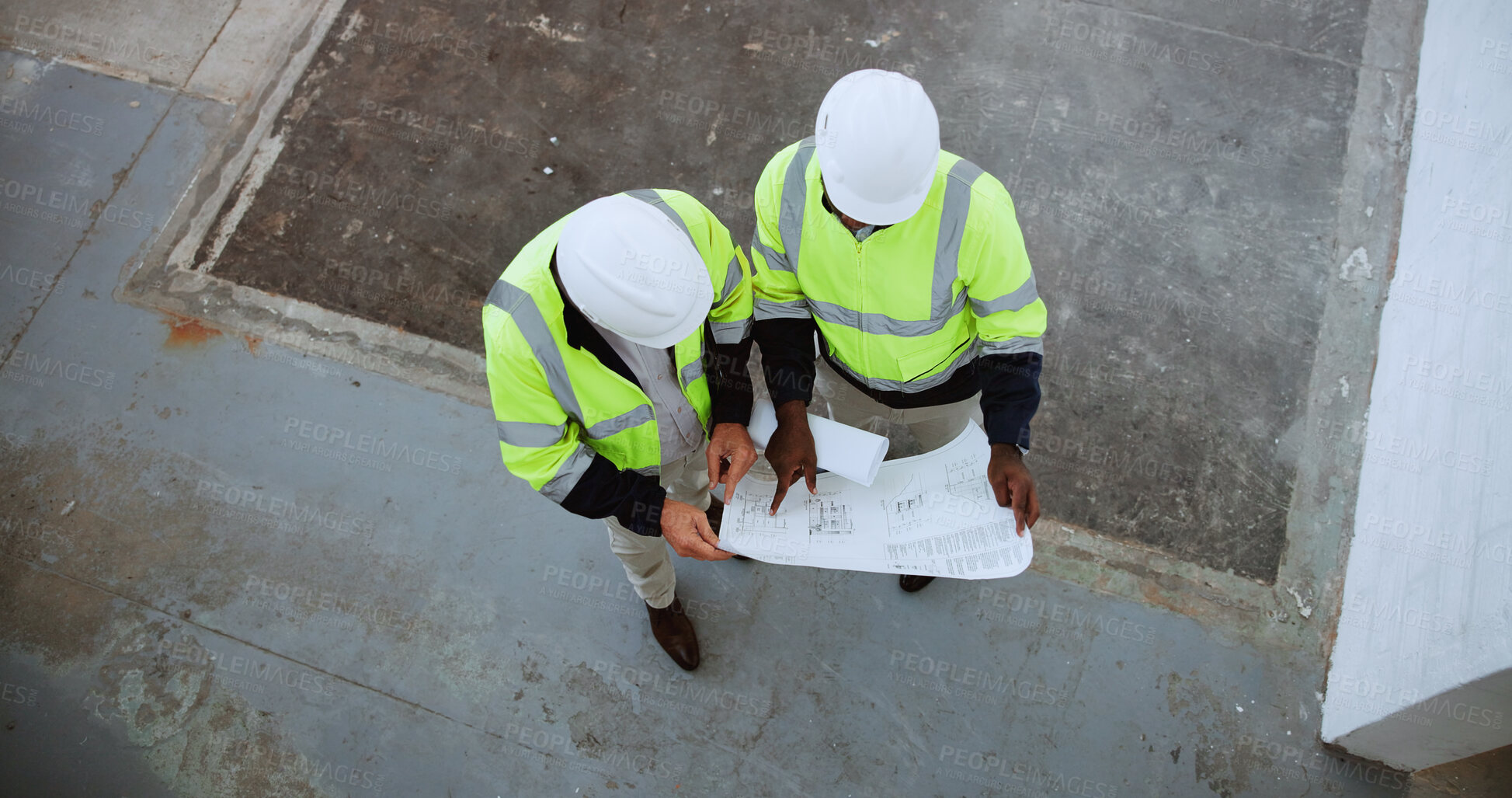 Buy stock photo Construction site, above and men with blueprint in building for collaboration, project ideas and renovation. Engineering, architecture team and people with documents for floorplan, layout and design