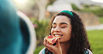 Pizza, snack and happy woman in park for eating fast food, lunch and meal on holiday in nature. Outdoor, taste or female person in garden on vacation for picnic, feast or bite of takeaway to relax