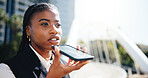 Businesswoman, speaker phone call and talk in city with networking, notification and deal on commute. African person, smartphone and discussion in town with reminder, voice notes and chat in Kenya