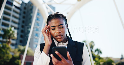 Buy stock photo Frustrated, black woman and headache with phone in city for bad news, burnout or mistake. Female person, migraine or pain with mobile smartphone, eye strain or vertigo for fail or depression in town