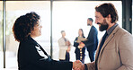 Office, business people and smile with handshake for greeting, welcome or hello for proposal meeting. Boardroom, clients and startup manager shaking hands for introduction, b2b deal or agency advice