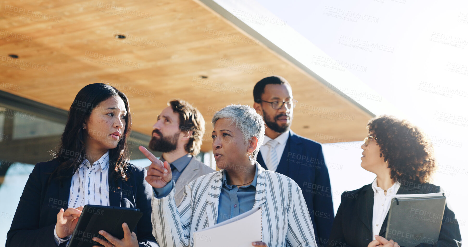 Buy stock photo Architecture, team and planning for project, outdoor or discussion for property development or talk. Collaboration, architect and people with ideas for real estate, brainstorming and colleagues
