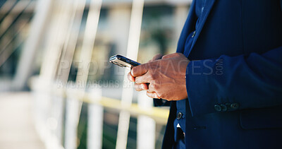 Buy stock photo Hands, phone and business black man in city for networking, contact and online connection. Corporate, professional and person typing on smartphone for website, internet news and email in urban town