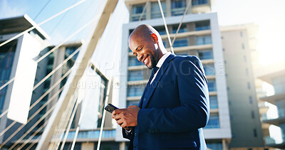 Buy stock photo Happy, phone and business black man in city for networking, contact and online connection. Corporate, low angle and person typing on smartphone for website, internet news and email in urban town