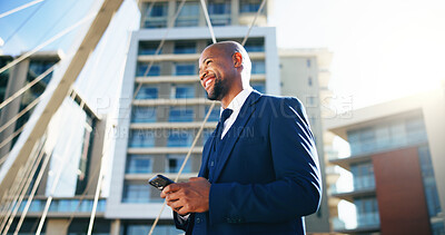 Buy stock photo Bridge, phone and business black man in city for networking, contact and online connection. Corporate, professional and person typing on smartphone for website, internet news and email in urban town