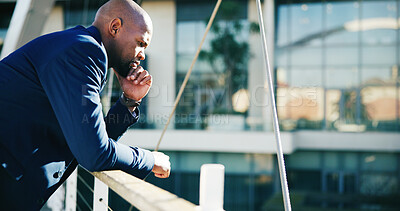 Buy stock photo Thinking, employee and man in city, serious or real estate agent with ambition for urban development. Outdoor, realtor and black person with ideas for property investment, opportunity and reflection