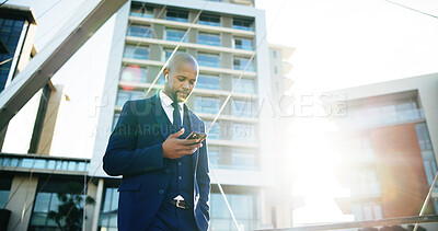 Buy stock photo Phone, communication and businessman in city for networking or email for investment proposal. Cellphone, flare and African male financial manager on mobile app for finance negotiation from below.