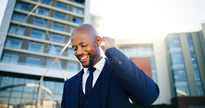 Buy stock photo Smile, business and black man with earphones in city for streaming, podcast and travel to work. Happy, male person and listening to music on journey outdoor, morning radio and urban commute for trip