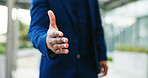 Business person, handshake and meeting with introduction for greeting, partnership or deal in city. Closeup, employee or recruiter shaking hands with gesture or agreement for hiring or recruiting