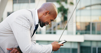 Buy stock photo Reading, phone and business black man in city for networking, contact and online connection. Corporate, professional and person typing on smartphone for website, internet news and email in urban town