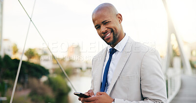 Buy stock photo Wink, phone and portrait of businessman in city for networking, contact and online connection. Corporate, happy and African person on smartphone for website, internet news and email in urban town