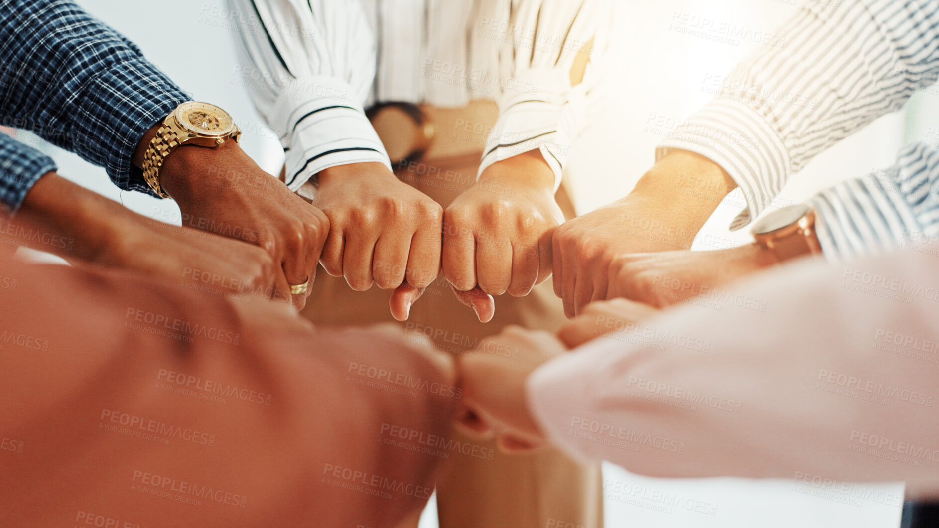 Buy stock photo Business people, hands and fist in huddle with support, collaboration or team building. United, staff mission or group of employees with circle in office for synergy, meeting or solidarity together