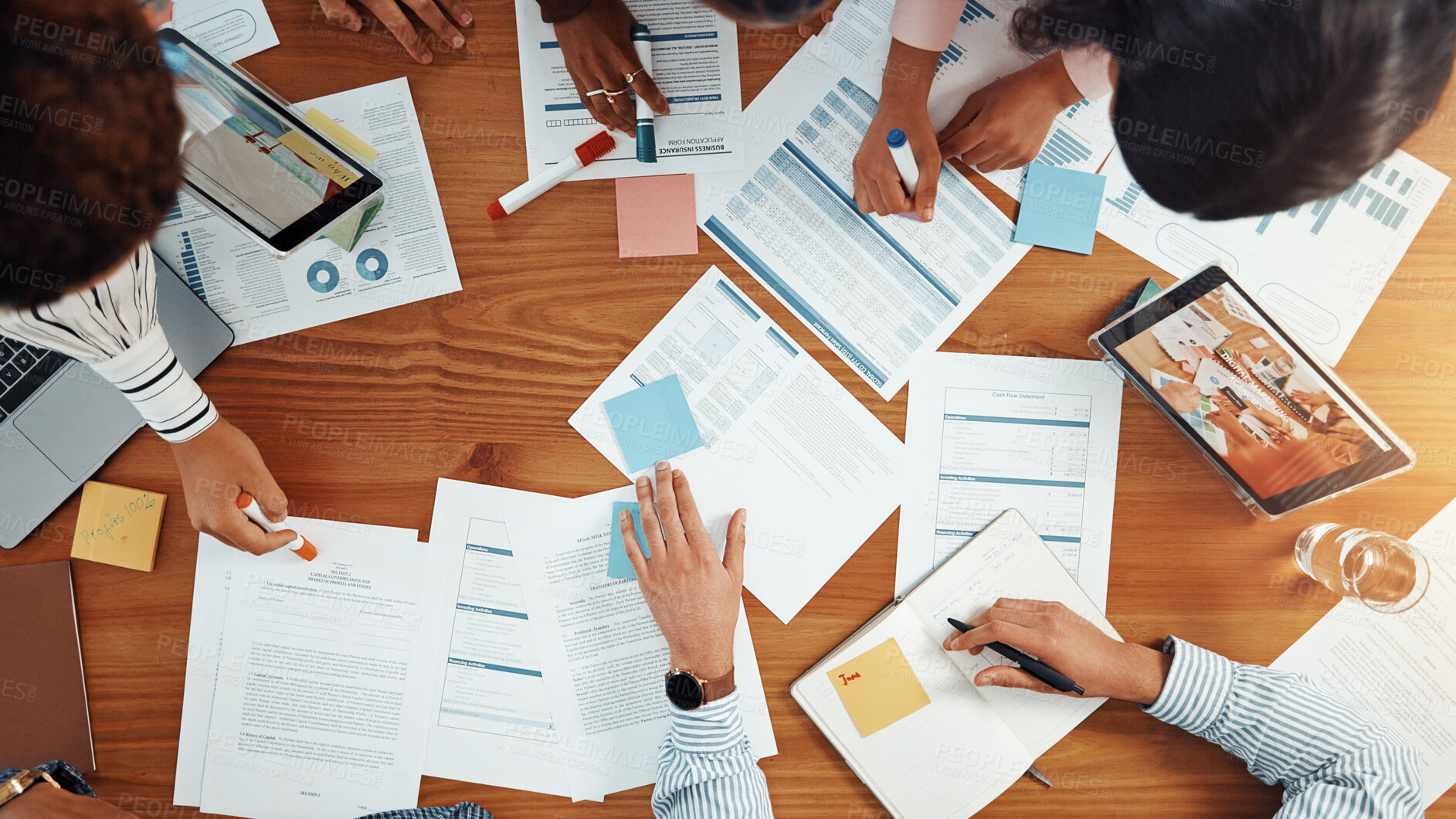 Buy stock photo Above, business people and discussion in meeting with graphs, data analysis and feedback. Teamwork, collaboration and documents for project, research and tech for chart review with paperwork or notes