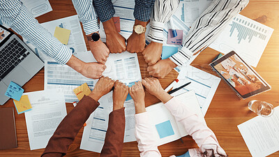 Buy stock photo Circle, fist bump and documents with hands of business people for meeting, account agreement and synergy. Budget performance, chart growth and solidarity with above of employees for team support