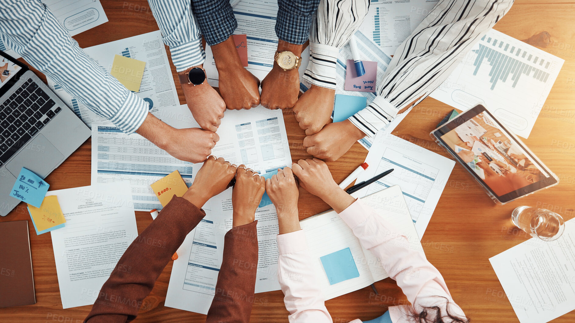 Buy stock photo Circle, fist bump and documents with hands of business people for meeting, account agreement and synergy. Budget performance, chart growth and solidarity with above of employees for team support