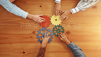 Buy stock photo Above, hands and business people with gears for solidarity, solution and support. Collaboration, employees or team building with space, system and pattern problem solving with link puzzle in office