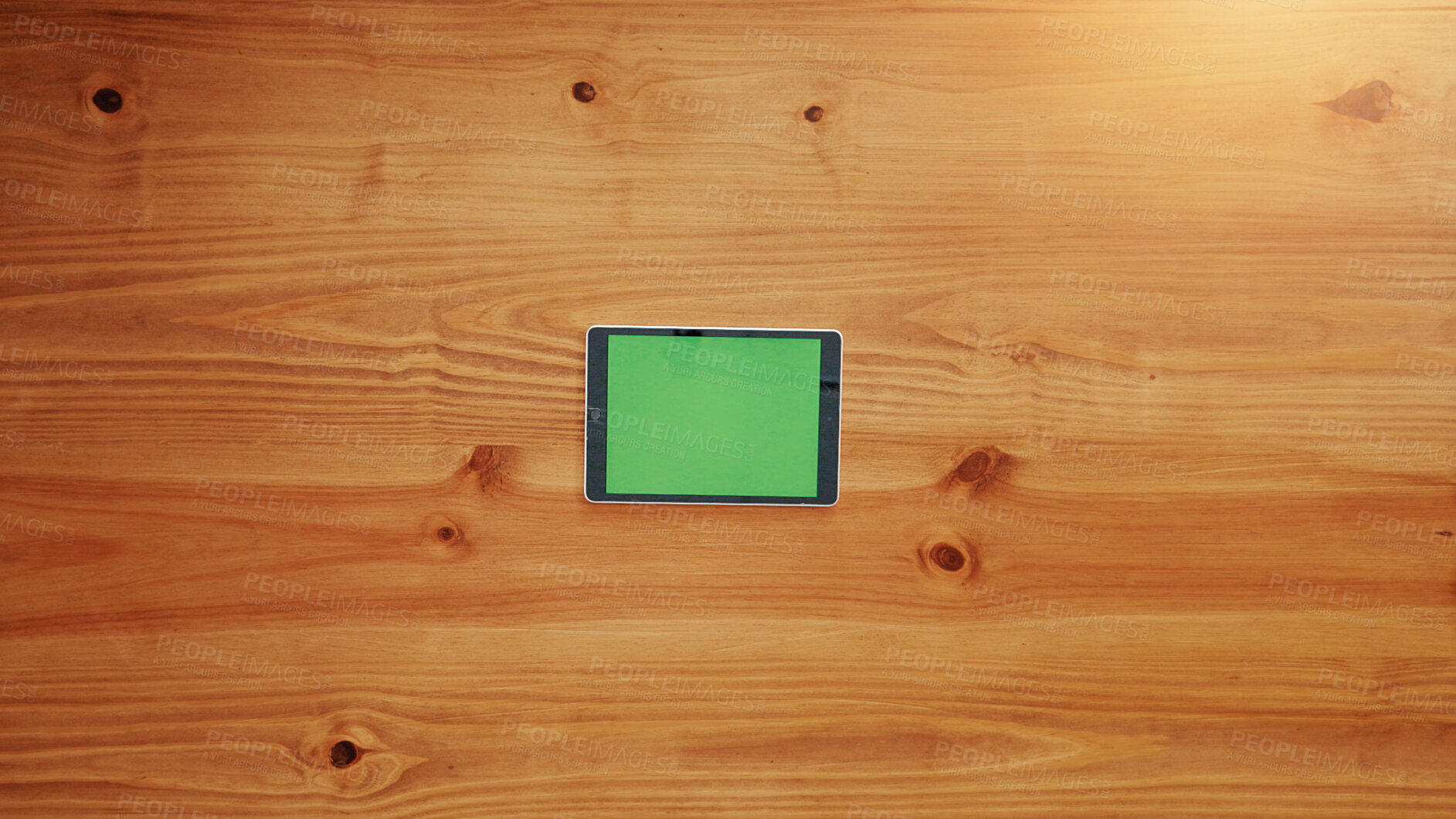 Buy stock photo Empty, tablet screen and wooden table above with space for advertising or marketing app. Top view, technology or chromakey display with mockup for UI, UX or online template on a timber background