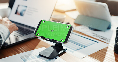Buy stock photo Phone, green screen and business person in office for research, finance report and performance. Mockup space, hand and laptop for financial planning, tax information and investment proposal graphs