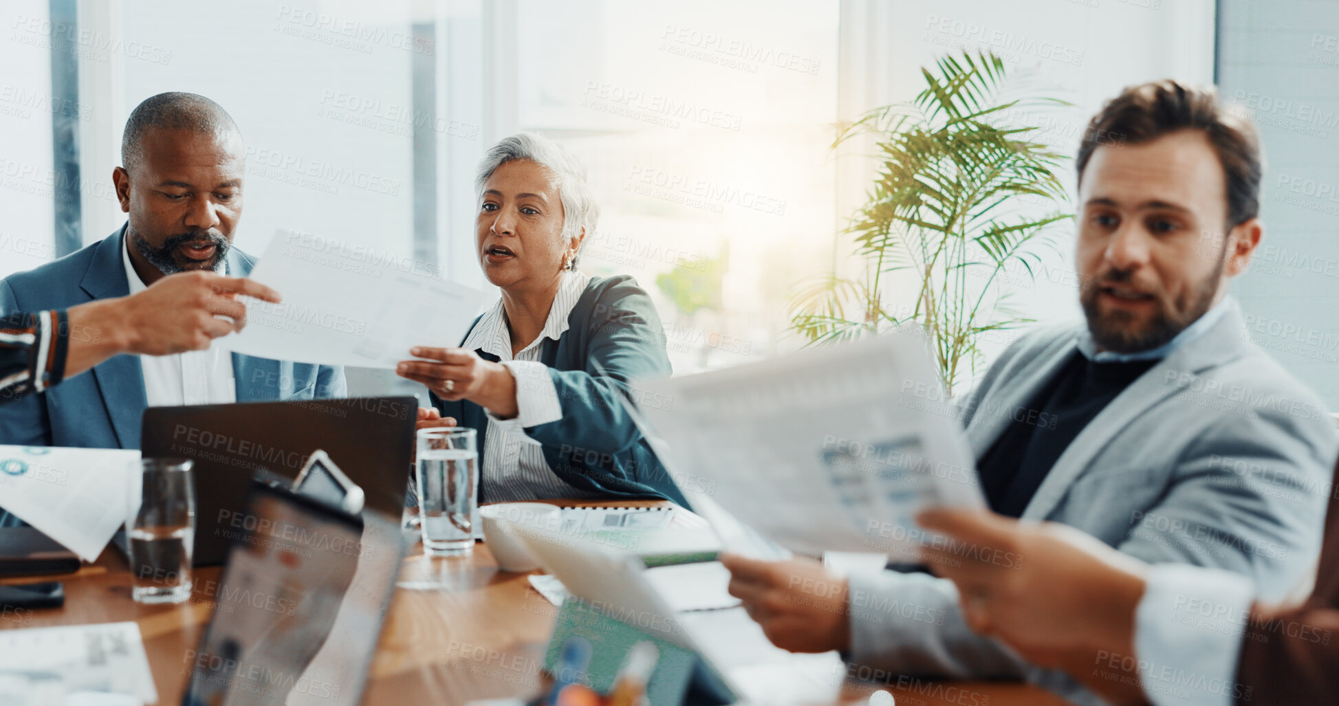 Buy stock photo Teamwork, meeting and documents with business people in office for budget report, stakeholder update and research. Ceo review, market analyst and partnership with employees in agency for discussion