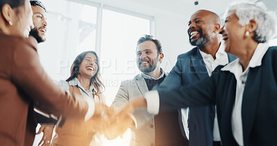 Buy stock photo Business people, laugh and hands together in huddle for goal, collaboration or corporate target. Smile, mission or group of employees in celebration for partnership, teamwork or success in office