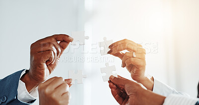 Buy stock photo Hands, business people and puzzle for team at office with solution, synergy and strategy at company. Group, jigsaw and problem solving with integration, challenge or collaboration at insurance agency
