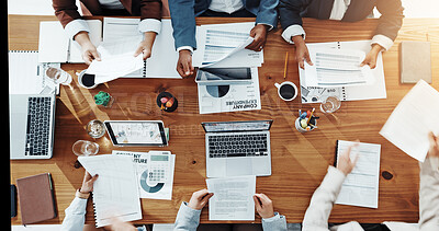 Buy stock photo Business, hands and people with paperwork in meeting for company expenditure, budget and auditing. Above, accounting teamwork and screen for revenue stats, financial analysis or forecasting in office