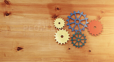Buy stock photo Above, gears and space on table for problem solving, planning and workflow in office. Business, cogs and mechanism on wood background for functional system, cooperation and workplace balance