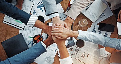 Buy stock photo Hands, stack and above at meeting with documents, finance, support and team work at office. Business people, group and circle with link, motivation or synergy with celebration for revenue at company