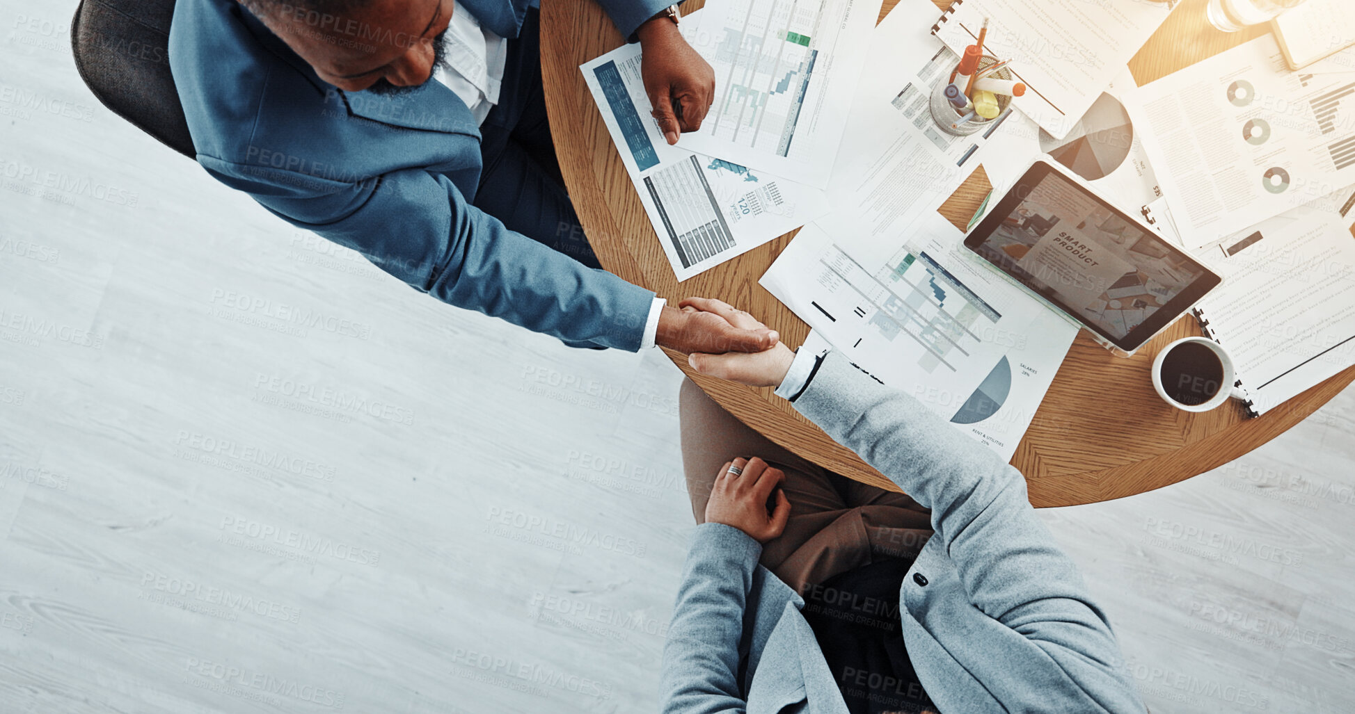 Buy stock photo Meeting, handshake and people with paperwork, deal and gesture for client in boardroom or agreement. Colleagues, collaboration or shaking hands for opportunity in office, above and success of merger