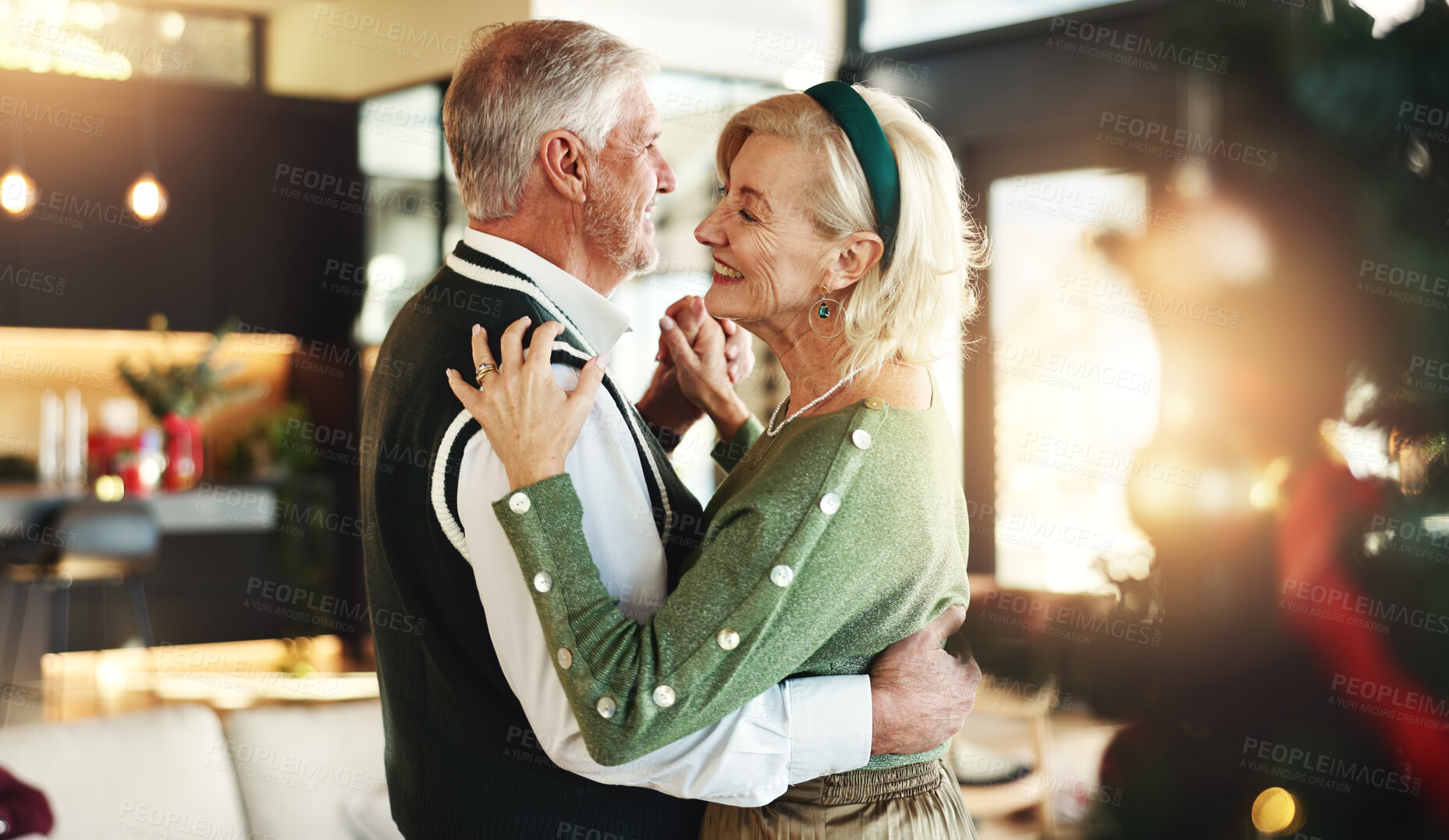 Buy stock photo Romance, couple and dancing for Christmas, home or smile in festive season, embrace and celebration. Happy, old woman and bonding with senior man on holiday, relationship and love on weekend in house