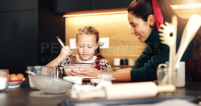Buy stock photo Christmas, girl and mom in kitchen baking, teaching and mixing ingredients for festive cookies. People, mother and daughter in family home with learning, smile and guide for xmas cooking together