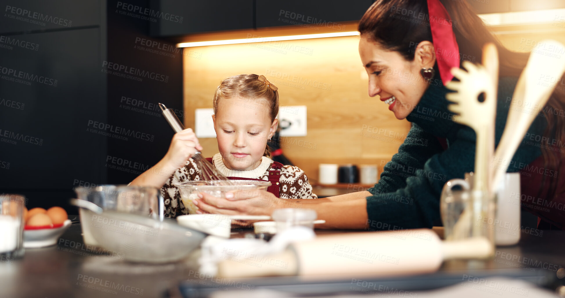 Buy stock photo Christmas, girl and mom in kitchen baking, teaching and mixing ingredients for festive cookies. People, mother and daughter in family home with learning, smile and guide for xmas cooking together
